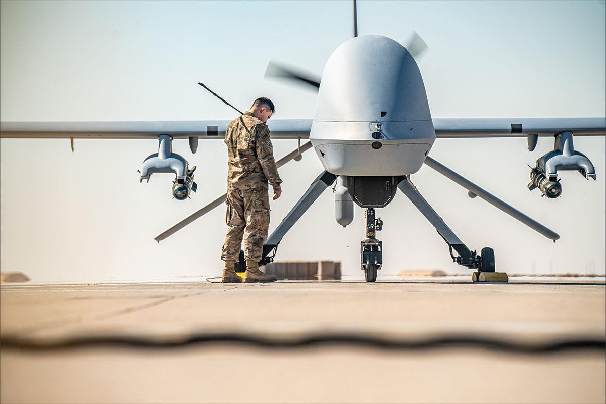 Military drone and soldier